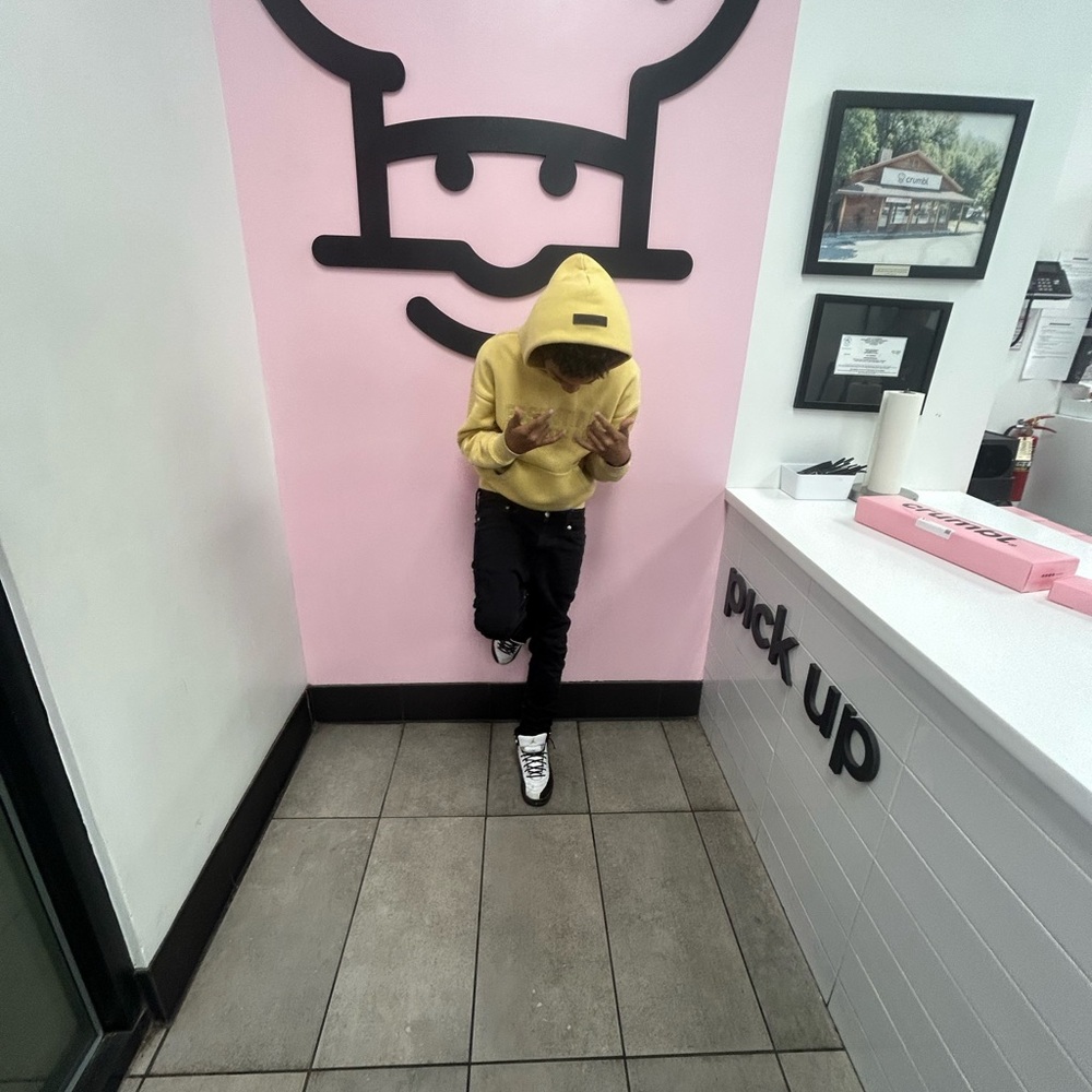 Yellow Hoodie and Black Pants Outfit